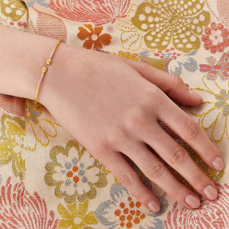 Nani's bangle Dancing Élite, yellow gold, BS7-583