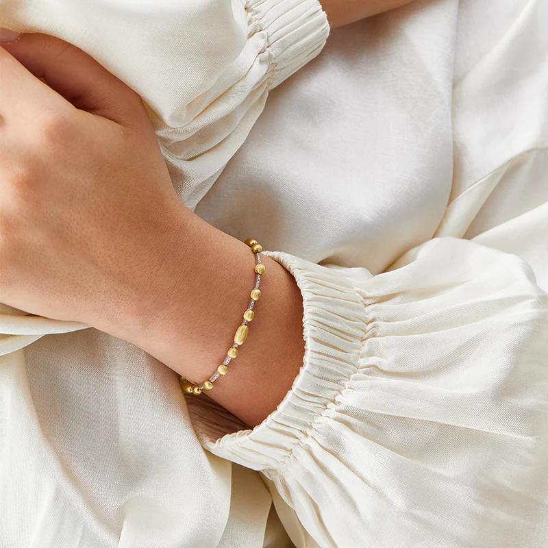 Nanis Armband Dancing Élite, Gelbgold, BS2-589
