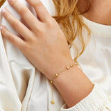 Nanis Armband Dancing Élite, Gelbgold, BN1-583